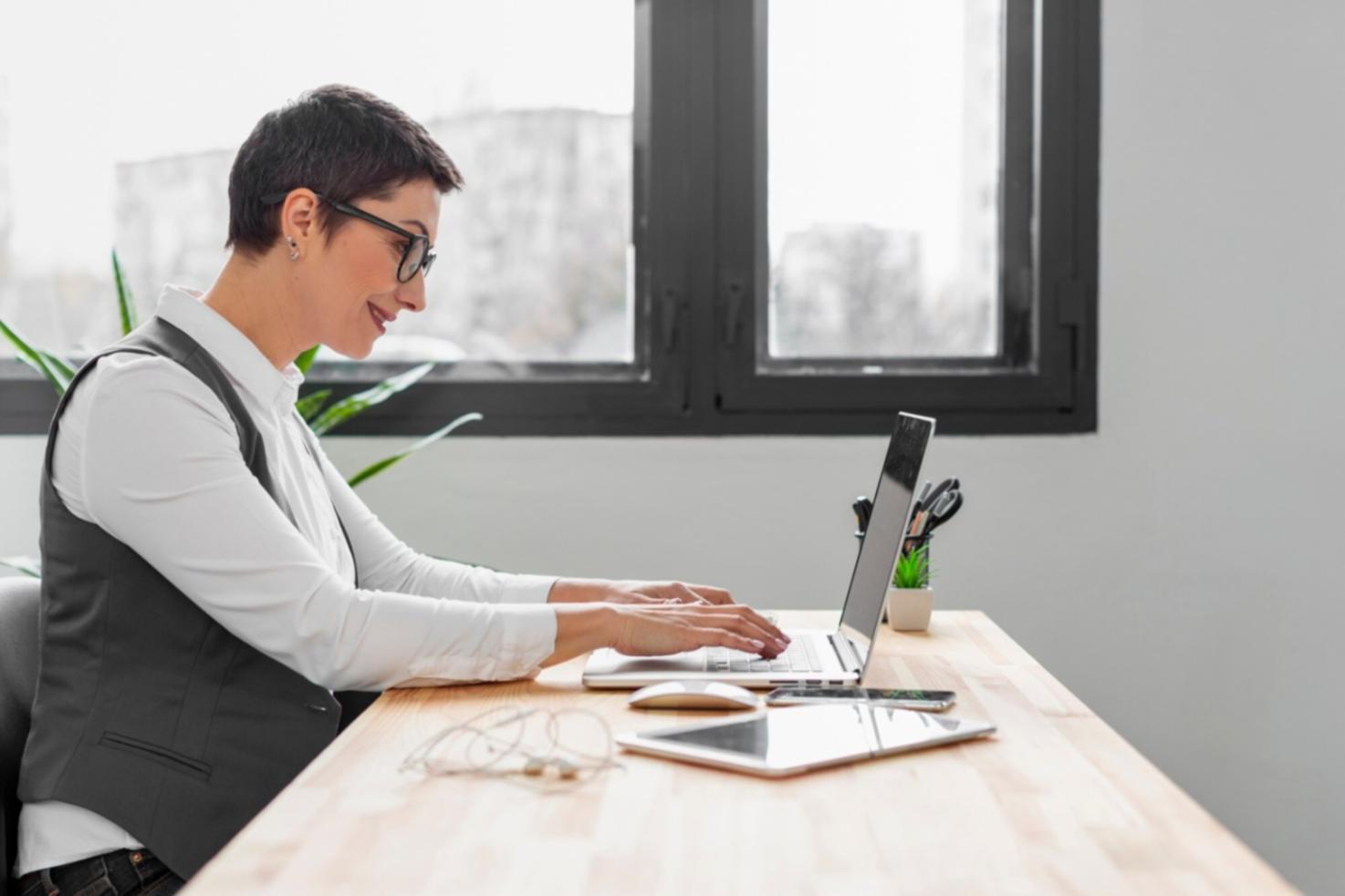 Students working on mobile game architecture projects